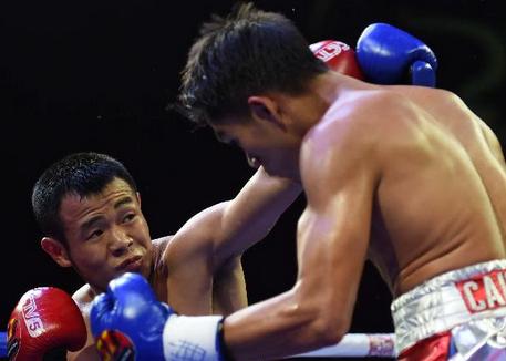 裘曉君完美TKO贏世界銀腰帶