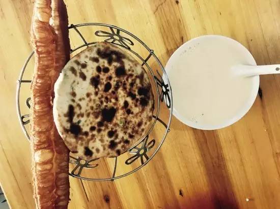 靠賣燒餅攢7套房