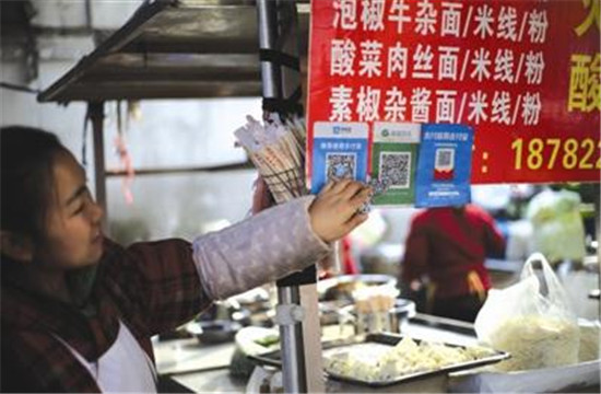 餐攤付款碼被調包