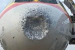客機遭遇冰雹 頭被打凹風擋被擊裂
