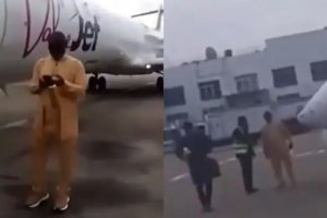 尼日利亞歌手被拒絕登機后站在飛機前阻止飛機起飛